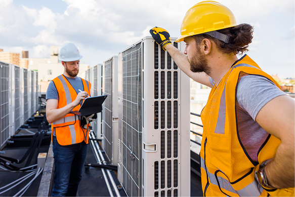 A technician training on an HVAC system, representing career accelerator programs.